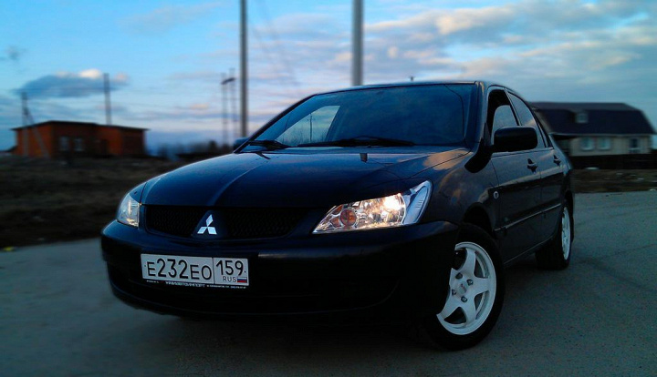 Mitsubishi Lancer 9. 2 года владения.