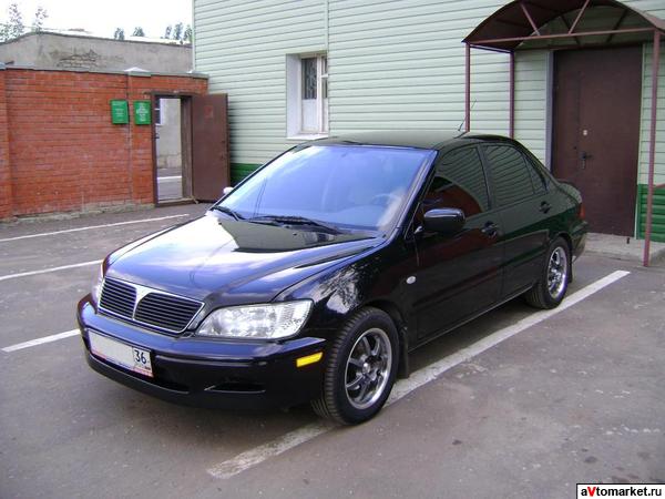 Mitsubishi Lancer ES 2003г. - Перламутровый улан.
