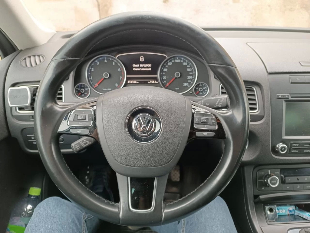 Как правильно снять руль на Volkswagen Touareg 2008 Замершее время udmirspb.ru